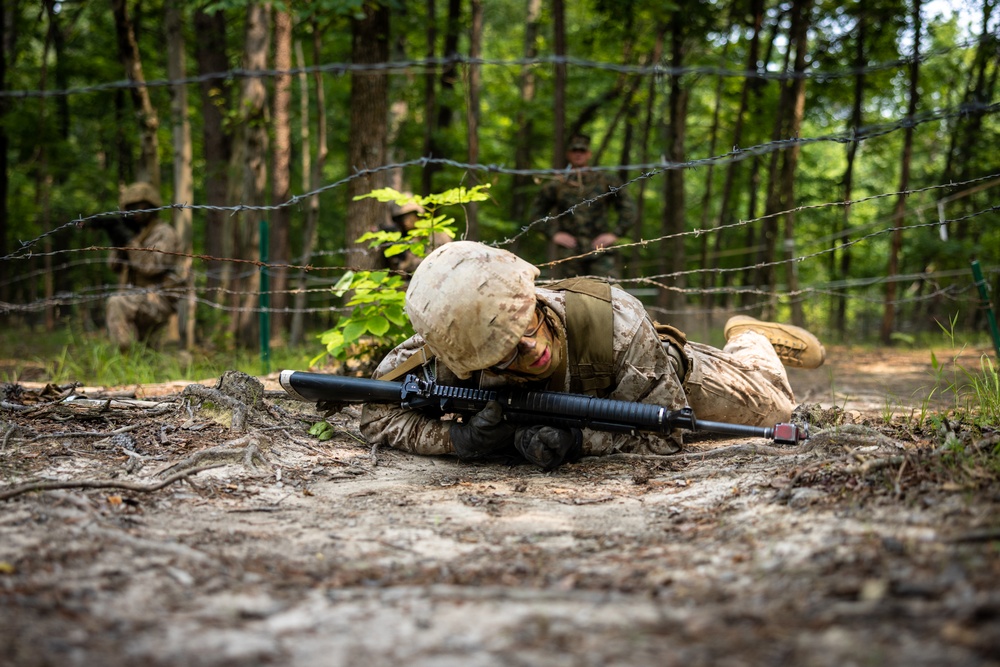 OCS Candidates Conduct the Fire Team Assault Course