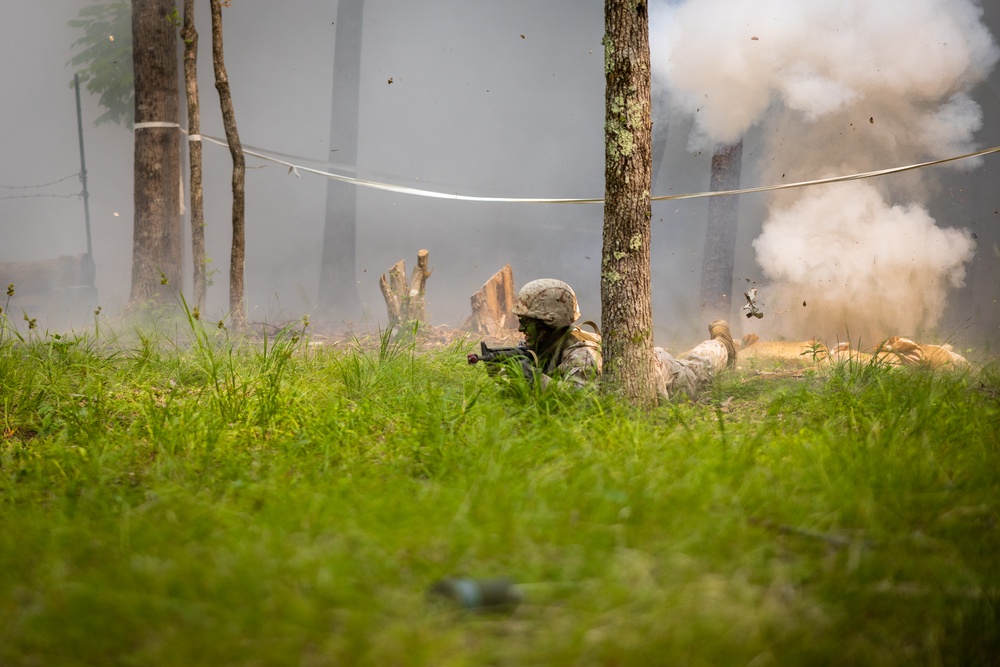 OCS Candidates Conduct the Fire Team Assault Course