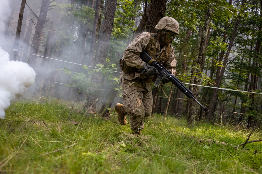 OCS Candidates Conduct the Fire Team Assault Course