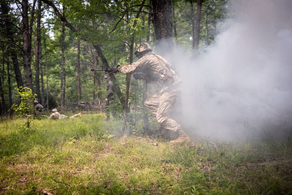 OCS Candidates Conduct the Fire Team Assault Course