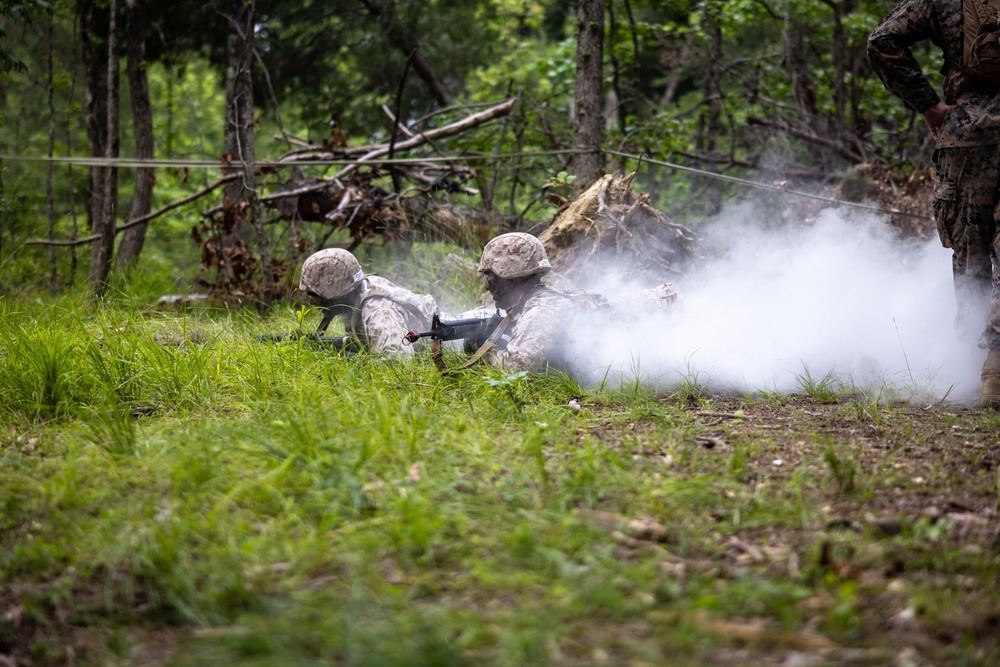 OCS Candidates Conduct the Fire Team Assault Course