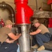 ESL Sailors Perform Fire Pump Diesel Repairs