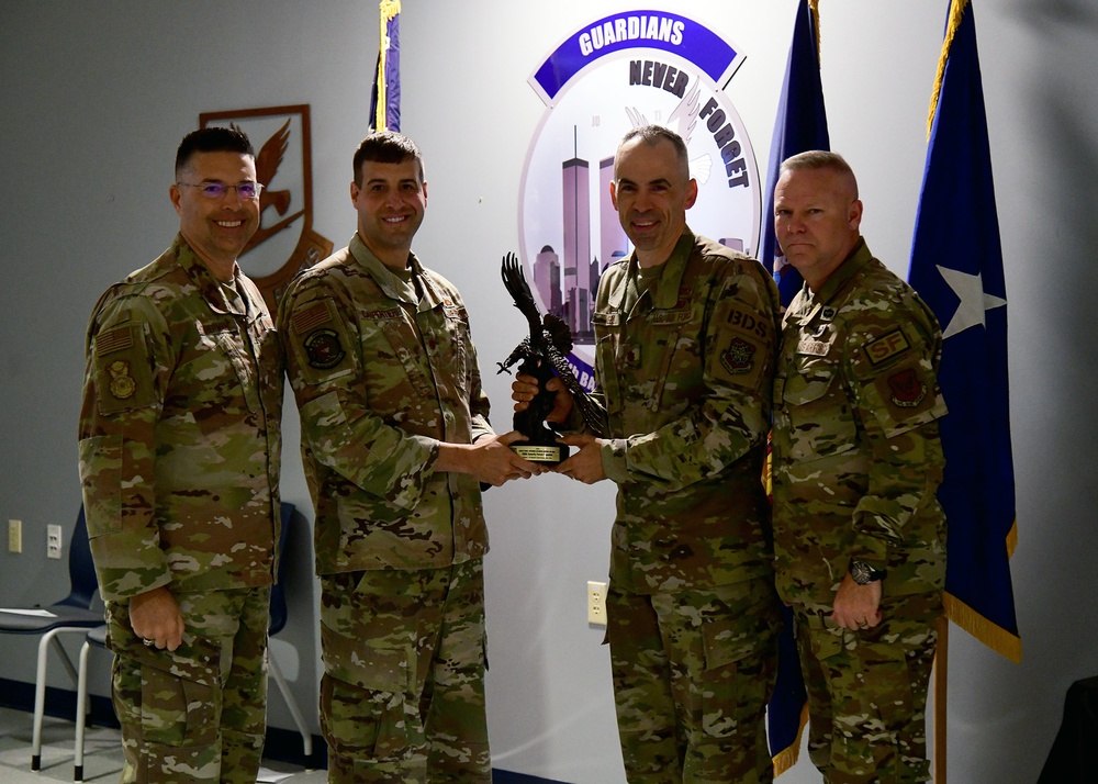 Security Forces Director presents 105th Defenders with the Security Forces Outstanding Air Reserve Component Unit Award