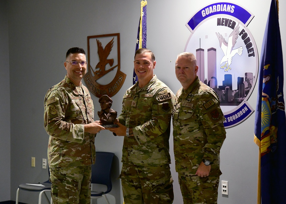 Security Forces Director presents 105th Defenders with the Security Forces Outstanding Air Reserve Component Unit Award