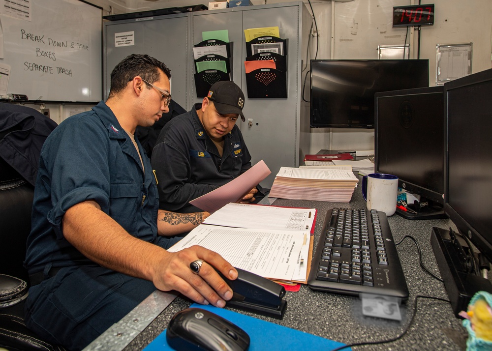 Sailor Works At Desk