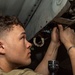 Sailor Conducts Maintenance