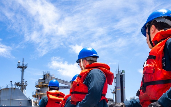 USS Robert Smalls (CG 62) Sailors Hold PND line during RAS