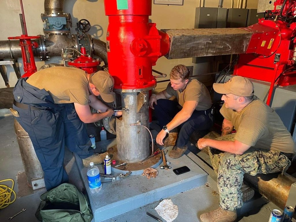 ESL Sailors Work on Fire Pump