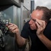 ESl Sailors Assess AC Unit on Anderson AFB