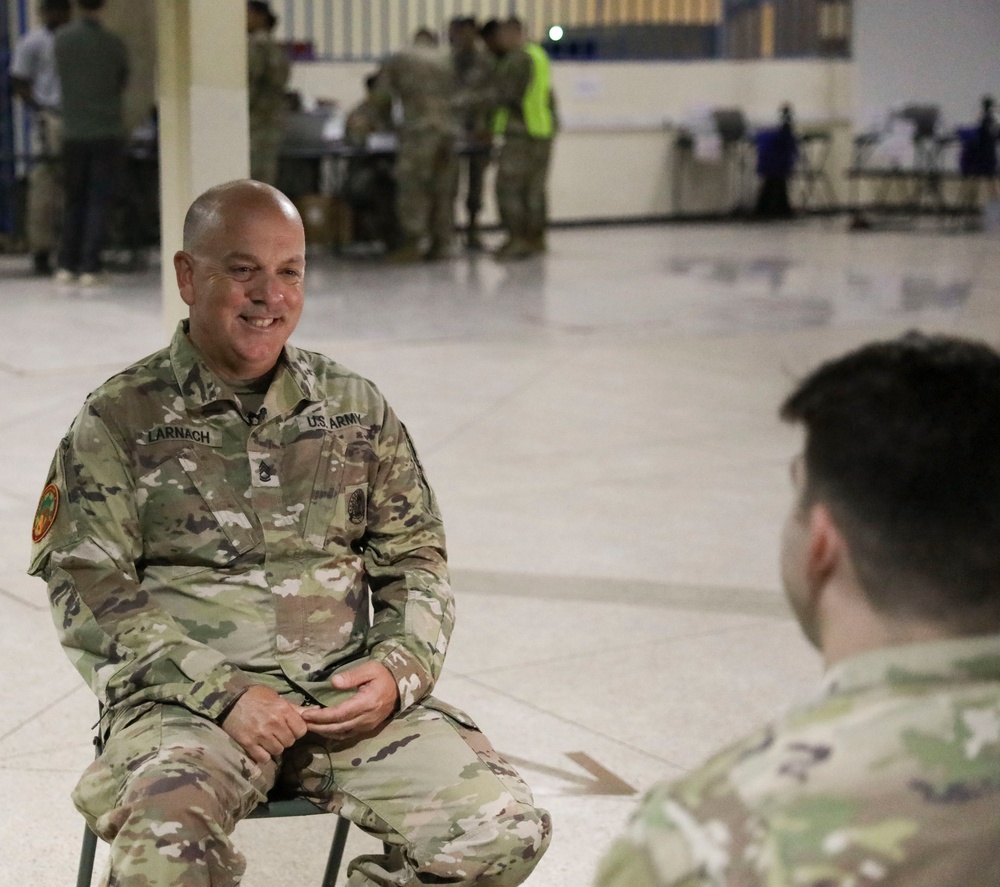 Father and Son Meet During Exercise African Lion