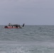 Marines swim to shore during amphibious qualification