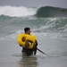 Marines swim to shore during amphibious qualification