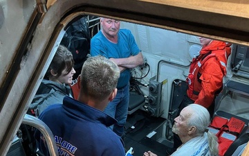 Coast Guard crews rescue 2 men from their capsized boat off the Southwest Oregon Coast