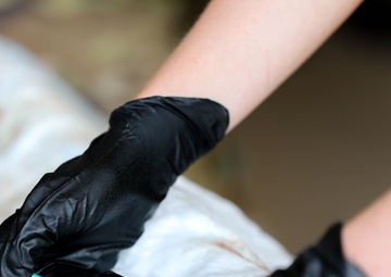 Service member teaches different training methods during joint exercise