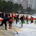 U.S., Japan and Philippine Coast Guard servicemembers conduct beach cleanup in Manila