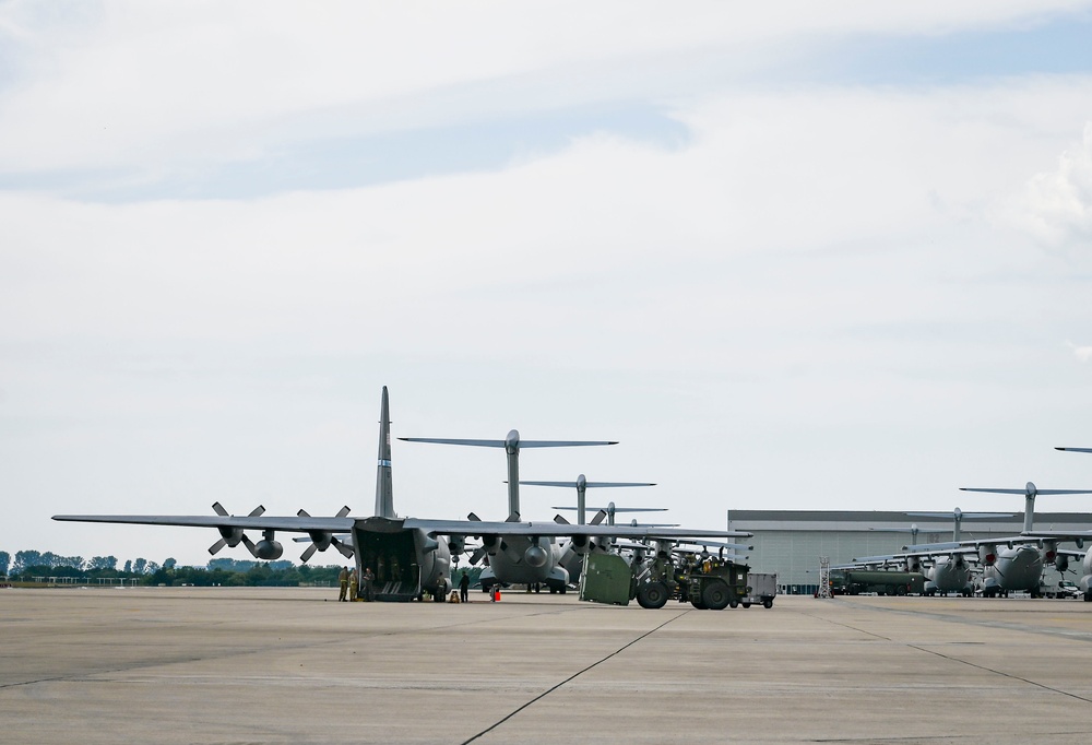 Air National Guard C-130 Hercules aircraft deliver cargo in preparation for exercise Air Defender 2023