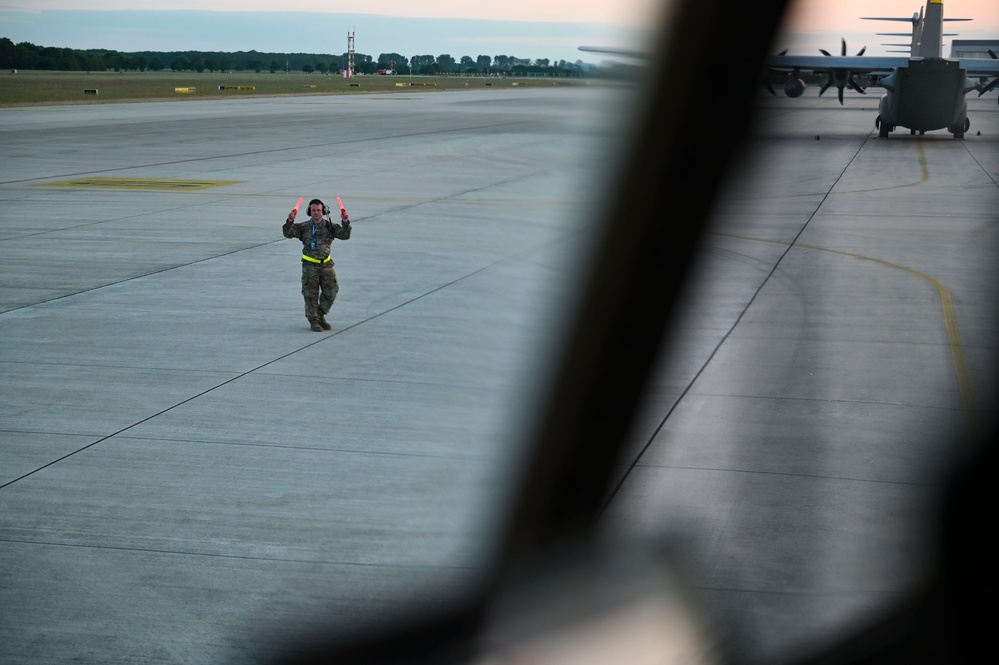 Air National Guard C-130 Hercules aircraft deliver cargo in preparation for exercise Air Defender 2023