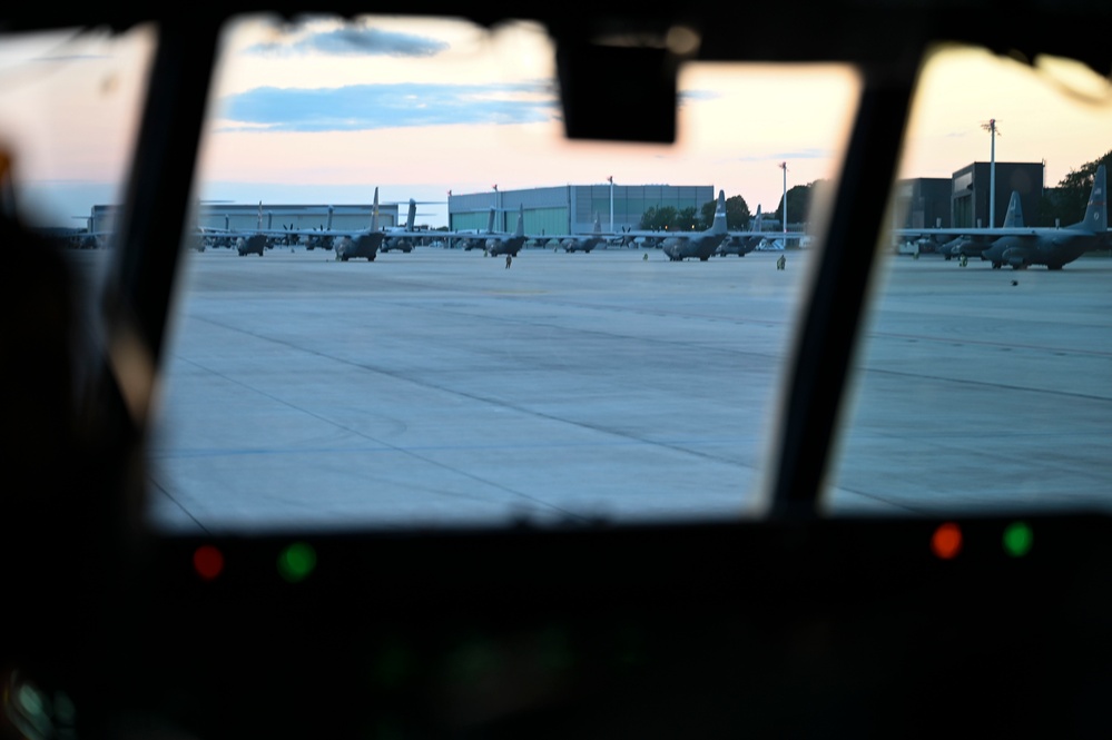 Air National Guard C-130 Hercules aircraft deliver cargo in preparation for exercise Air Defender 2023