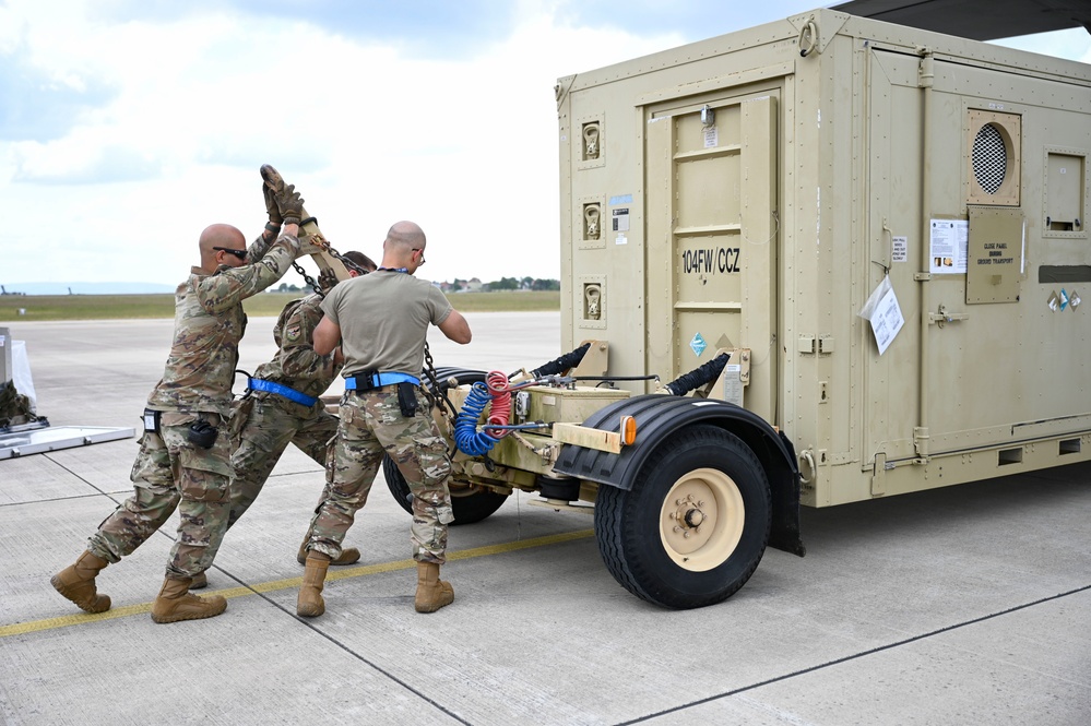 Air National Guard C-130 Hercules aircraft deliver cargo in preparation for exercise Air Defender 2023