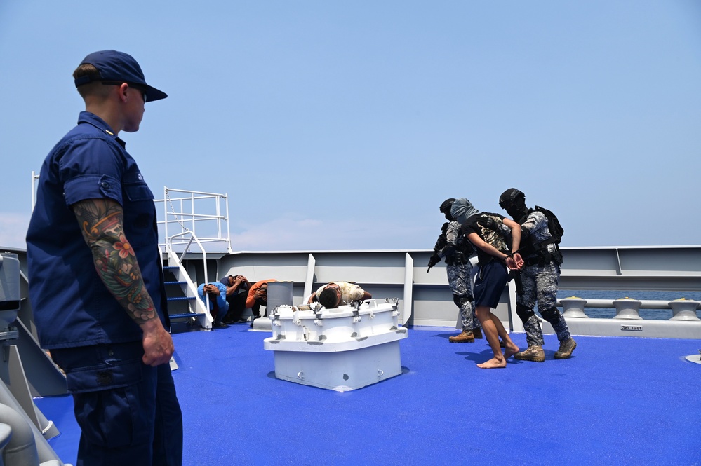 Philippine, Japan and U.S. Coast Guards participate in simulated law enforcement scenario during trilateral engagements in South China Sea