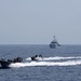 Philippine, Japan and U.S. Coast Guards participate in simulated law enforcement scenario during trilateral engagements in South China Sea