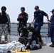 Philippine, Japan and U.S. Coast Guards participate in simulated law enforcement scenario during trilateral engagements in South China Sea