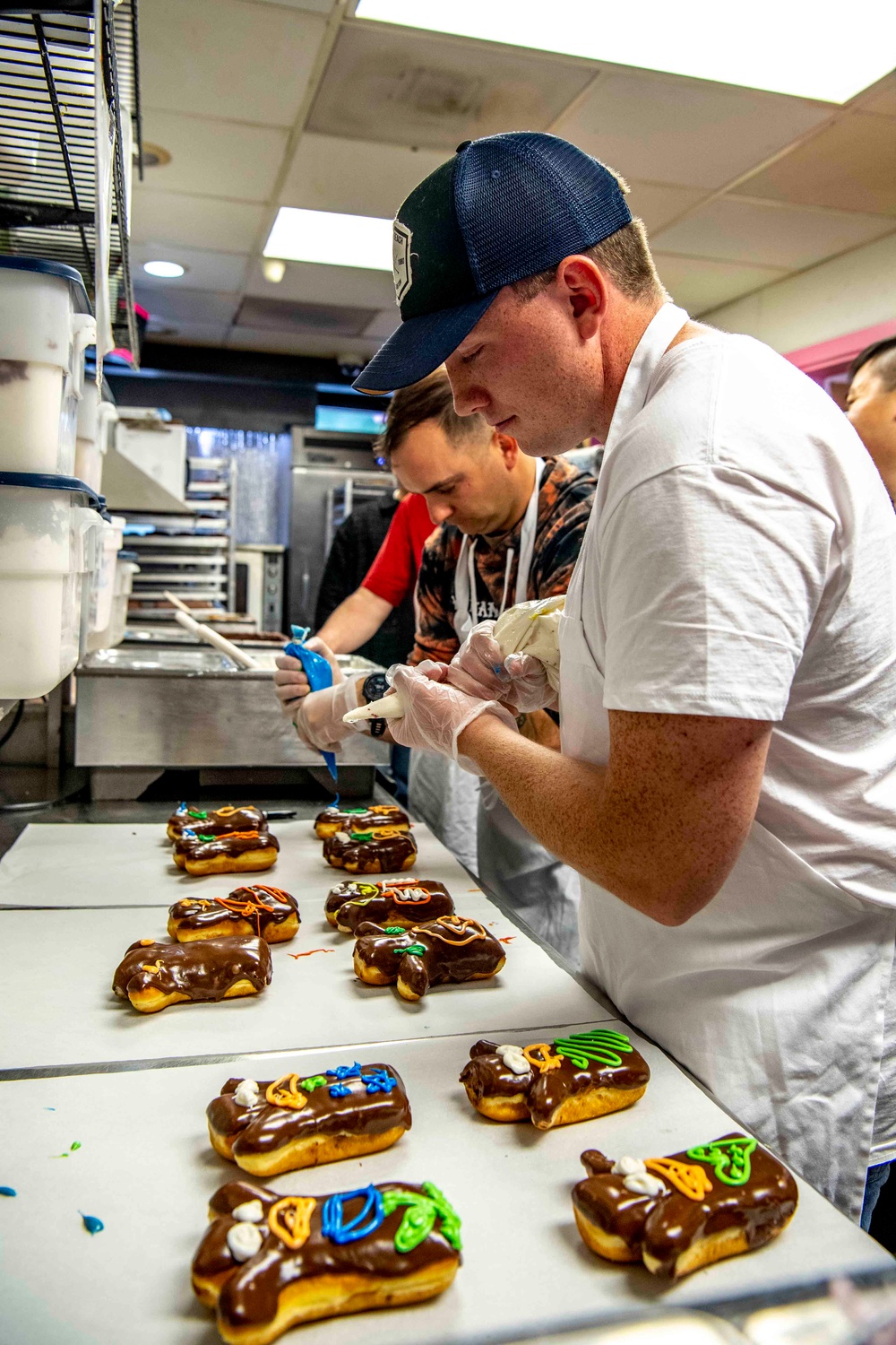 Sailors Volunteer at Voodoo Doughnut