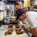 Sailors Volunteer at Voodoo Doughnut