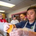 Sailors Volunteer at Voodoo Doughnut