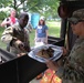 4th Infantry Division Soldiers participate in a cookout with students at an English language school in Boleslawiec, Poland