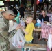 4th Infantry Division Soldiers participate in a cookout with students at an English language school in Boleslawiec, Poland