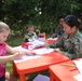 4th Infantry Division Soldiers participate in a cookout with students at an English language school in Boleslawiec, Poland