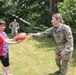 4th Infantry Division Soldiers participate in a cookout with students at an English language school in Boleslawiec, Poland