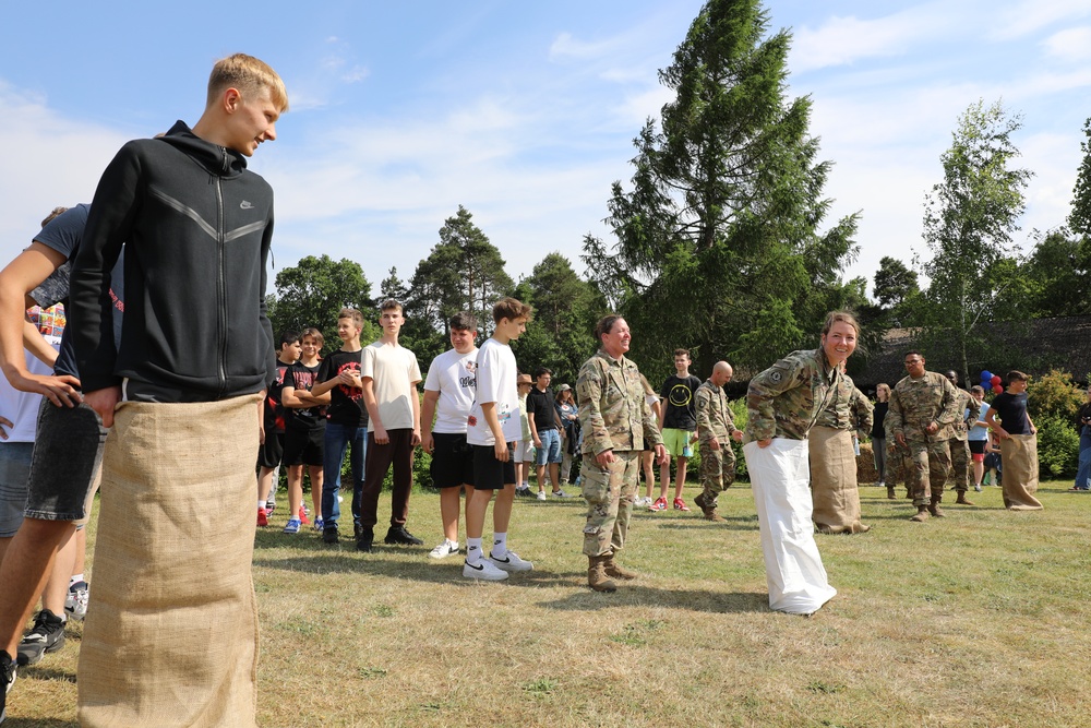 4th Infantry Division Soldiers participate in a cookout with students at an English language school in Boleslawiec, Poland