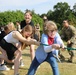 4th Infantry Division Soldiers participate in a cookout with students at an English language school in Boleslawiec, Poland