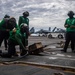 Nimitz Raises Emergency Crash Barricade