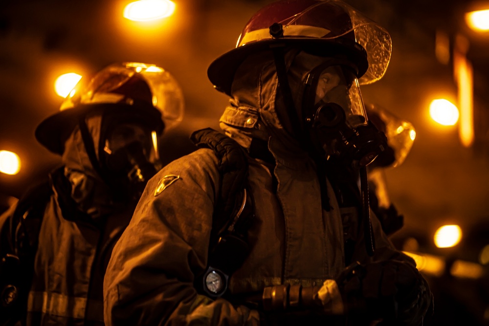 Sailors Participate In A Flying Squad Drill