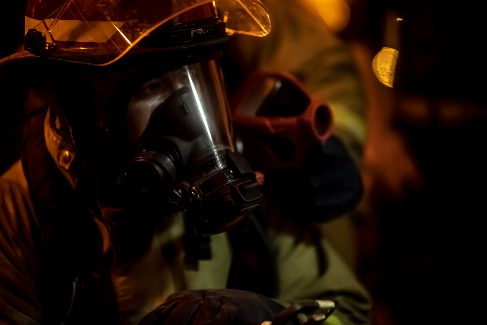 Sailors Participate In A Flying Squad Drill