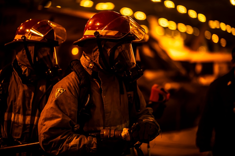 Sailors Participate In A Flying Squad Drill