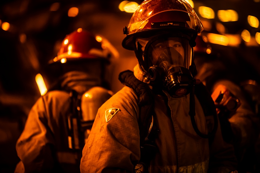 Sailors Participate In A Flying Squad Drill