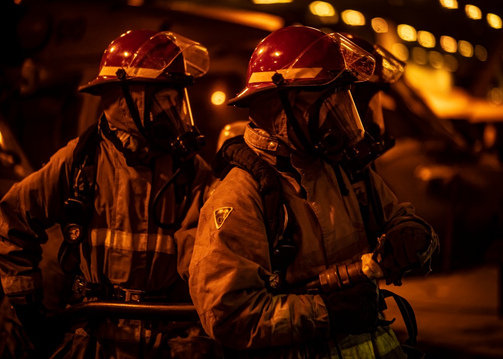 Sailors Participate In A Flying Squad Drill