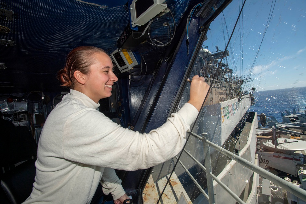 U.S. Navy Sailor Tracks Aircraft