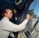 U.S. Navy Sailor Tracks Aircraft