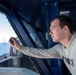 U.S. Navy Sailor Tracks Aircraft