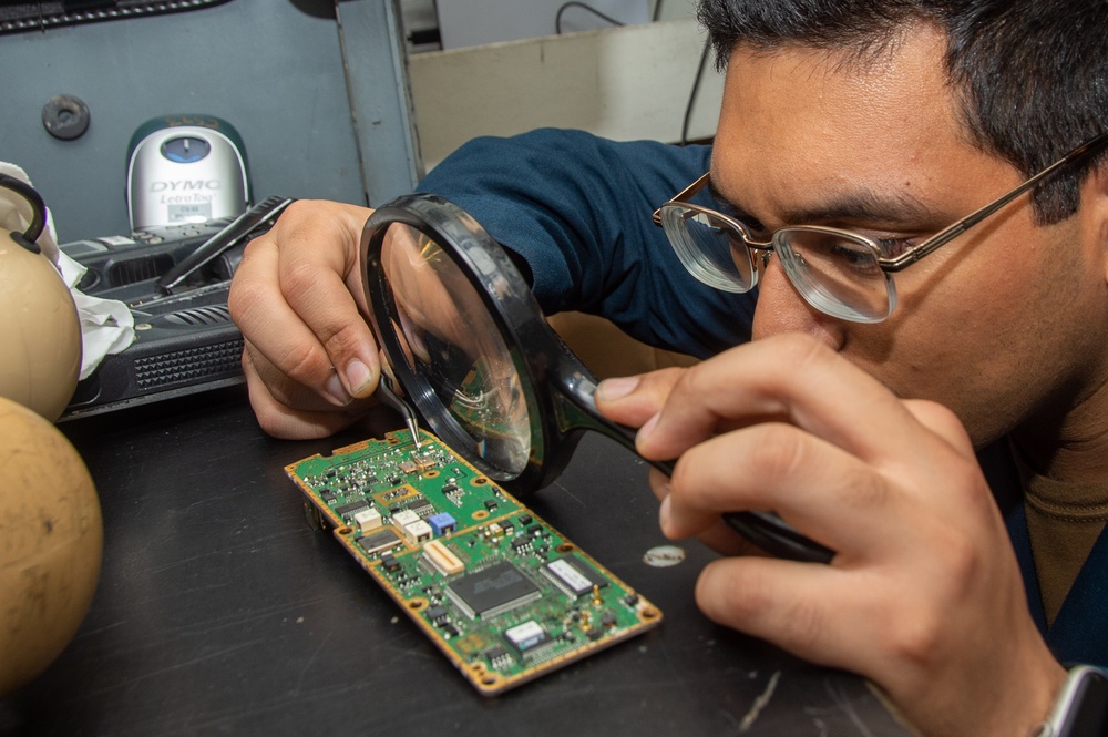USS Ronald Reagan (CVN 76) Sailors maintain internal communication systems