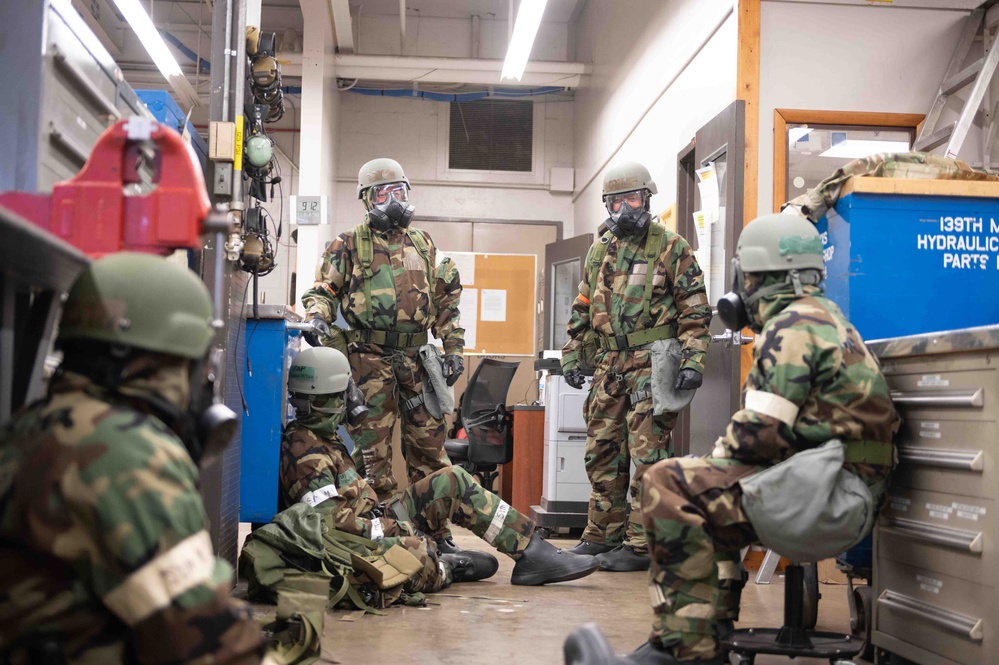 Airmen complete essential tasks in chem gear