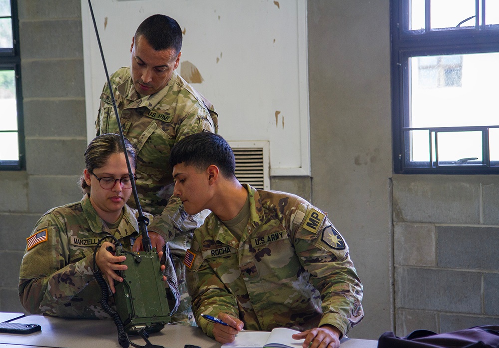 50th Regional Support Group HHC Soldiers practice radio skills during AT