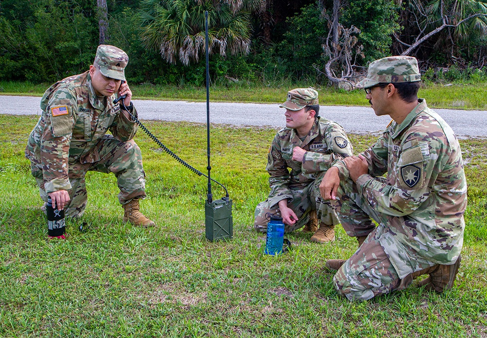 50th Regional Support Group HHC Soldiers practice radio skills during AT