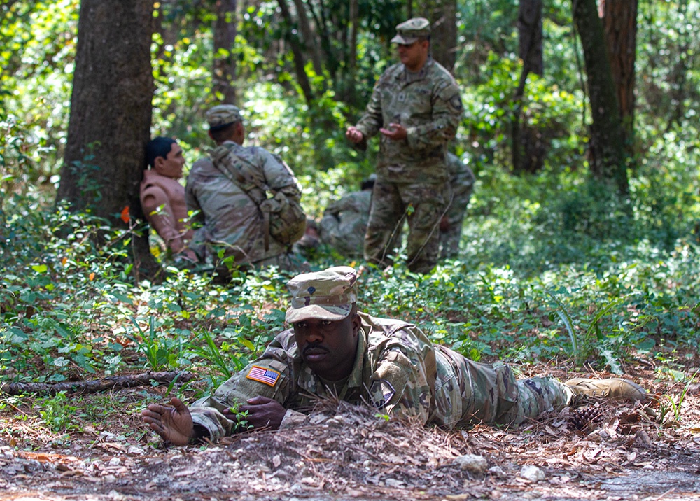 50th Regional Support Group HHC Soldiers practice combat first aid skills during AT