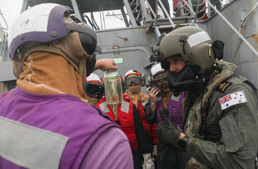 USS Milius (DDG 69) Conducts Deck Landing Qualifications with Royal Australian Navy